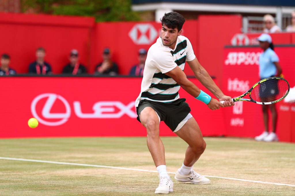Carlos Alcaraz hits a backhand against Jiri Lehecka at the 2025 Queen's Club Championships