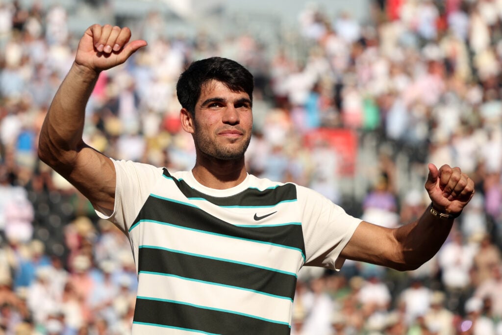 Carlos Alcaraz celebrates his win over Roberto Bautista Agut at Queen's