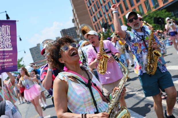 NEW YORK, NEW YORK - JUNE 21: People in a variety of colorful costumes participate in the 43rd annual Mermaid Parade at Coney Island on June 21, 2025 in New York City. The annual Mermaid Parade marks the beginning of summer in NYC and pays tribute to Coney Island's Mardi Gras celebrations in the early 1900's. (Photo by Michael M. Santiago/Getty Images)