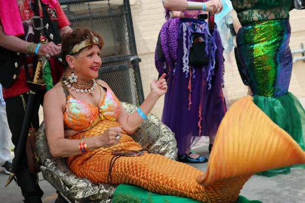 NEW YORK, NEW YORK - JUNE 21: People in a variety of colorful costumes prepare to participate in the 43rd annual Mermaid Parade at Coney Island on June 21, 2025 in New York City. The annual Mermaid Parade marks the beginning of summer in NYC and pays tribute to Coney Island's Mardi Gras celebrations in the early 1900's. (Photo by Michael M. Santiago/Getty Images)
