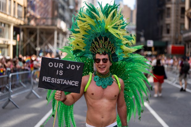 NEW YORK, NEW YORK - JUNE 29: People take part in the 2025 NYC Pride March on June 29, 2025 in New York City. The annual Pride parade is expected to draw more than a million people for the largest Pride event in North America. It will feature 60 floats and over 75,000 marchers. (Photo by Adam Gray/Getty Images)
