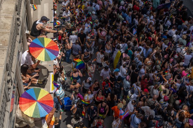 NEW YORK, NEW YORK - JUNE 29: Crowds watch as people take part in the 2025 NYC Pride March on June 29, 2025 in New York City. The annual Pride parade is expected to draw more than a million people for the largest Pride event in North America. It will feature 60 floats and over 75,000 marchers. (Photo by Adam Gray/Getty Images)