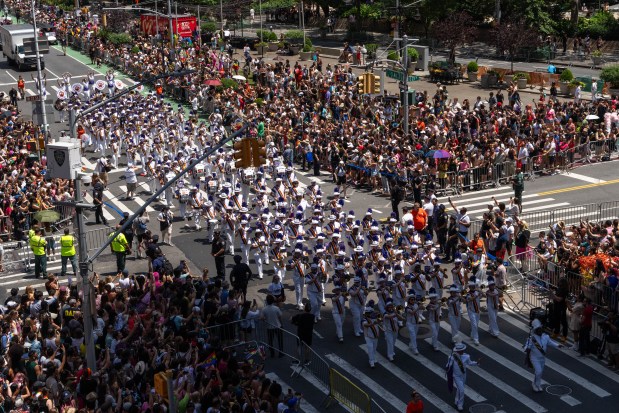 NEW YORK, NEW YORK - JUNE 29: People take part in the 2025 NYC Pride March on June 29, 2025 in New York City. The annual Pride parade is expected to draw more than a million people for the largest Pride event in North America. It will feature 60 floats and over 75,000 marchers. (Photo by Adam Gray/Getty Images)
