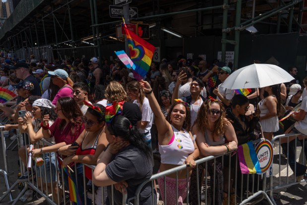 NEW YORK, NEW YORK - JUNE 29: Crowds watch as people take part in the 2025 NYC Pride March on June 29, 2025 in New York City. The annual Pride parade is expected to draw more than a million people for the largest Pride event in North America. It will feature 60 floats and over 75,000 marchers. (Photo by Adam Gray/Getty Images)