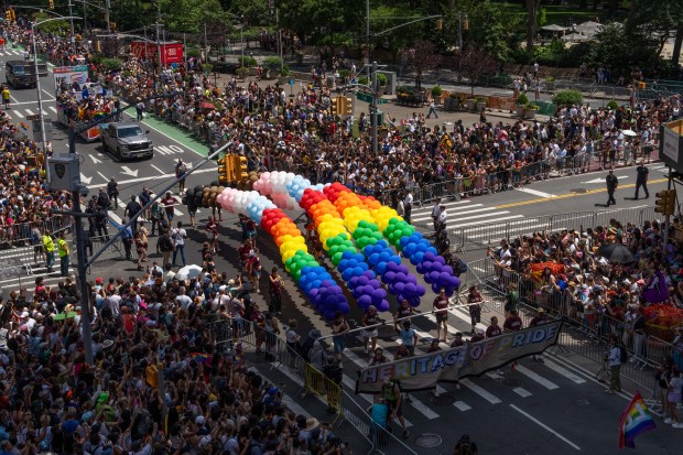 NEW YORK, NEW YORK - JUNE 29: Crowds watch as people take part in the 2025 NYC Pride March on June 29, 2025 in New York City. The annual Pride parade is expected to draw more than a million people for the largest Pride event in North America. It will feature 60 floats and over 75,000 marchers. (Photo by Adam Gray/Getty Images)