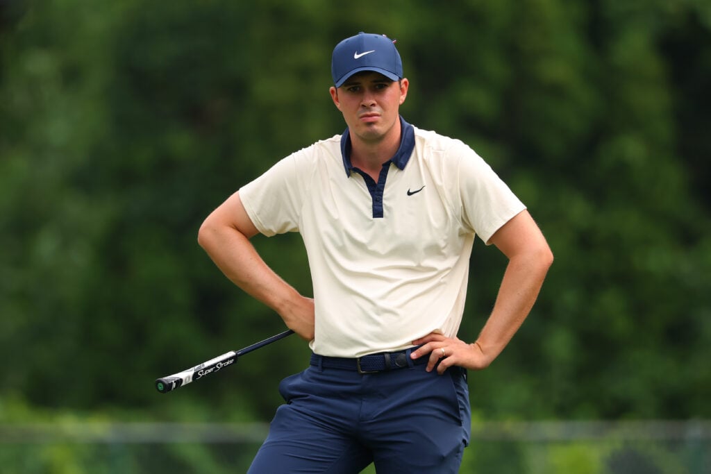 Davis Thompson looks on from the eighth green on day two of the Rocket Classic