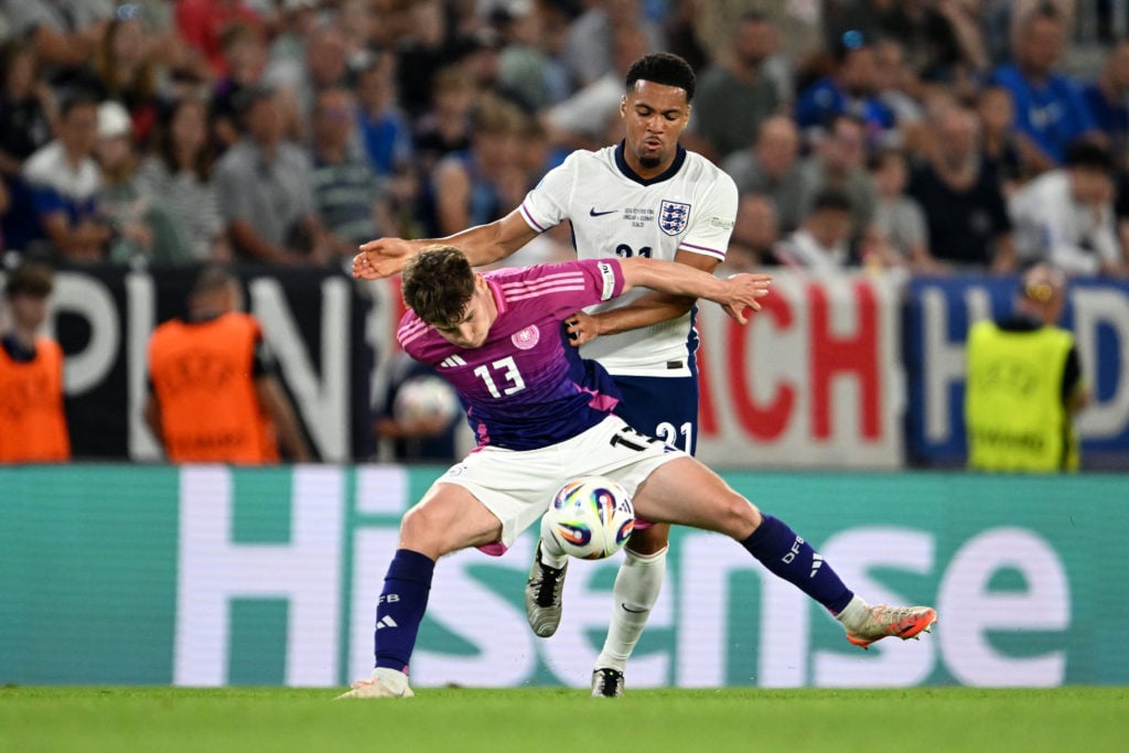 Ethan Nwaneri duels with a German defender for England U21s.
