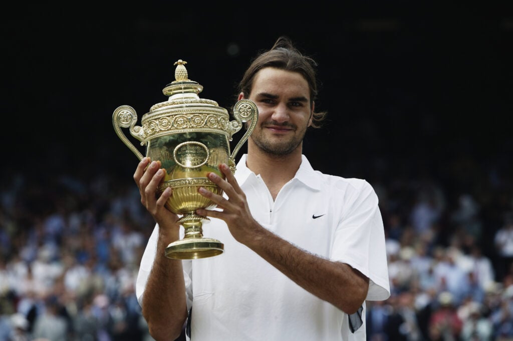 Roger Federer of Switzerland holds the trophy