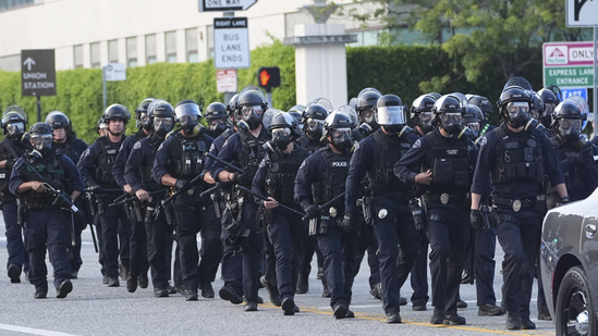 Officers with protective shields stood shoulder in Los Angeles.(Representational image/AP)
