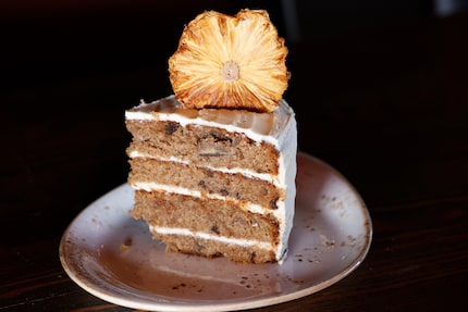 A big slice of Hummingbird Cake is one of several desserts at Jaxon Texas Kitchen in Irving.