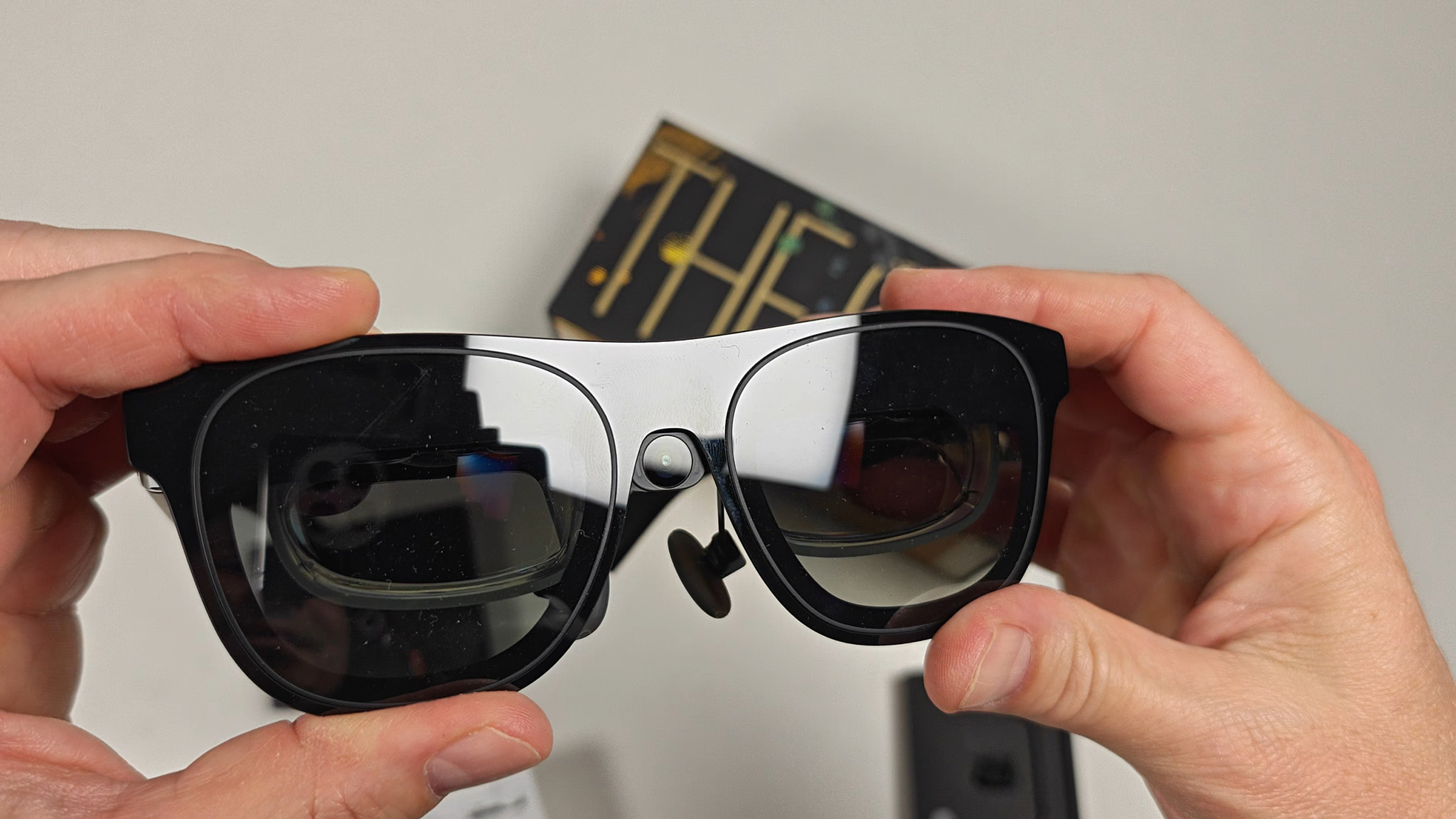 The Xreal Eye camera installed in a pair of Xreal One smart glasses