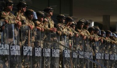 California National Guard are positioned at the Federal Building on June 10, 2025, in downtown Los Angeles. (AP Photo/Eric Thayer)