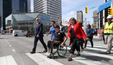 Pedestrians reclaim Portage and Main as Winnipeg reopens the famed intersection after 46 years