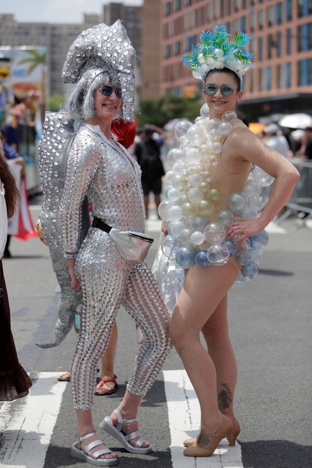 Paradegoers dressed in all types of aquatic themed costumes, march and perform in the 43rd Annual Coney Island Mermaid Parade in Brooklyn New York on June 21, 2025. (Photo by Andrew Schwartz)