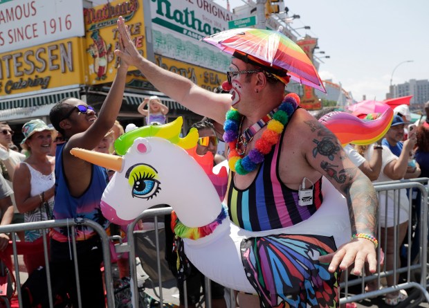 Paradegoers dressed in all types of aquatic themed costumes, march and perform in the 43rd Annual Coney Island Mermaid Parade in Brooklyn New York on June 21, 2025. (Photo by Andrew Schwartz)