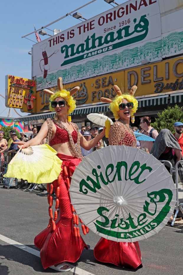 Paradegoers dressed in all types of aquatic themed costumes, march and perform in the 43rd Annual Coney Island Mermaid Parade in Brooklyn New York on June 21, 2025. (Photo by Andrew Schwartz)