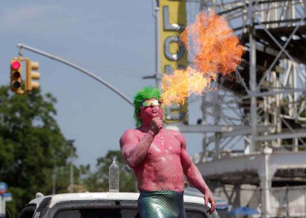 Paradegoers dressed in all types of aquatic themed costumes, march and perform in the 43rd Annual Coney Island Mermaid Parade in Brooklyn New York on June 21, 2025. (Photo by Andrew Schwartz)