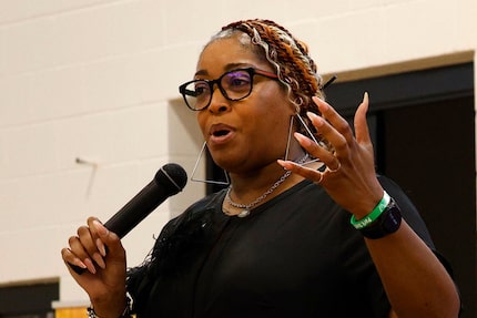 Rodrigua Ross, former executive director of the Park South YMCA, speaks during a...