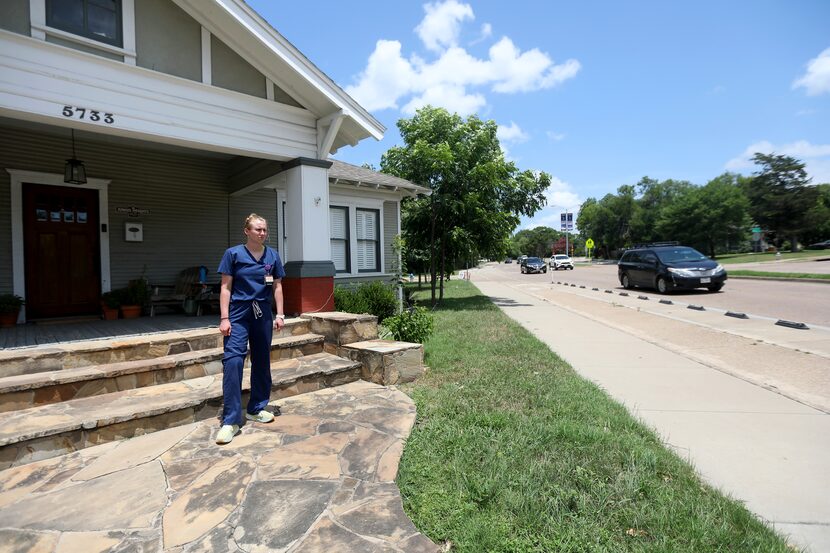 Rachel Feig watches traffic pass her home. Feig’s neighborhood is surrounded by three...