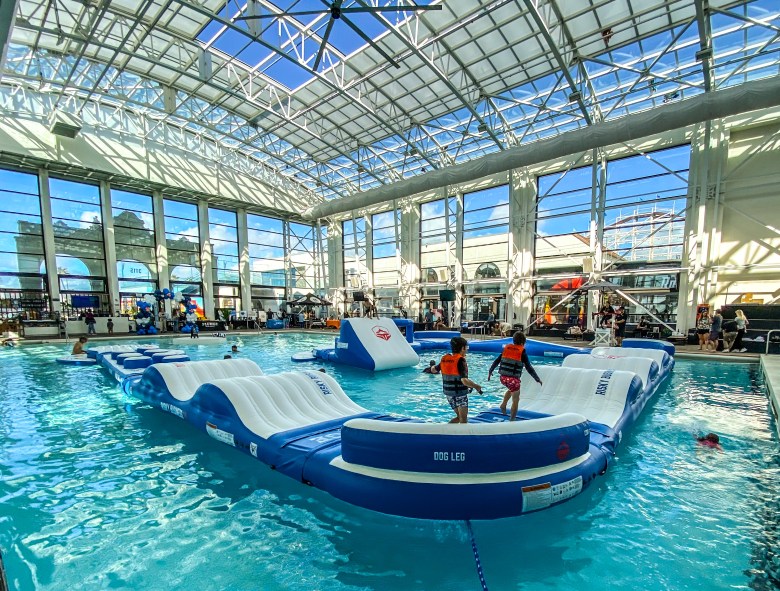 Today’s Plunge boasts floor-to-ceiling glass walls, a retractable roof, a poolside dining deck, and a floating obstacle course. (File photo by Thomas Melville)