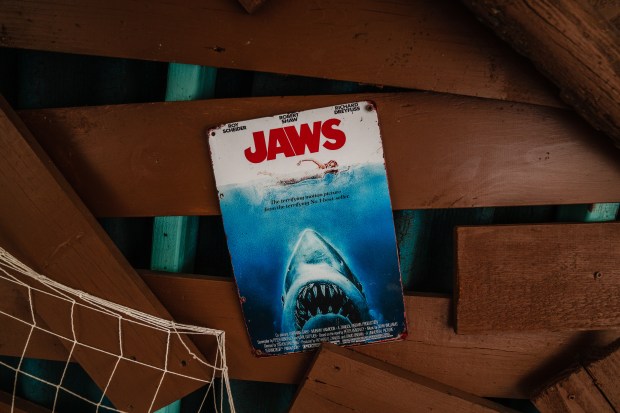 A "Jaws" film poster in Tiffany and Jared Marshall’s backyard...