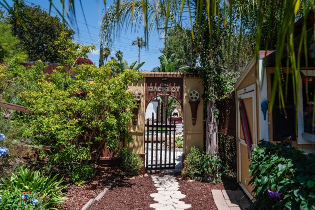 The entrance to Jared and Tiffany Marshall's backyard that is a homage to Hollywood in Lakeside on May 30, 2025. (Ariana Drehsler / For The San Diego Union-Tribune)