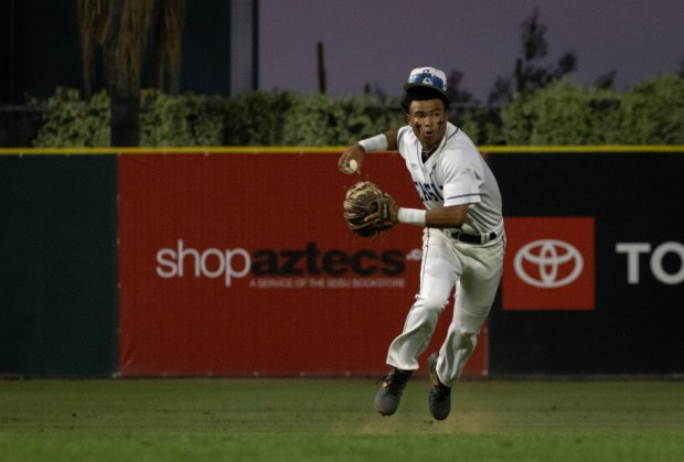 Granite Hills High School's Brenden Lewis (2) prepares to throw a ball during the Open Division championship game on Friday, May 30, 2025 in San Diego, California. (Ana Ramirez / The San Diego Union-Tribune)