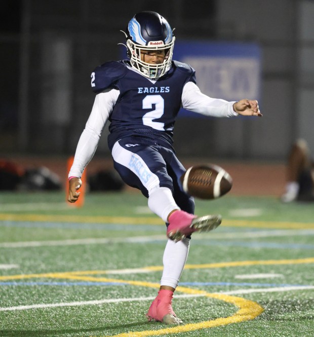 Granite Hills' Brenden Lewis punts the ball during the third quarter against Cathedral Catholic at Granite Hills High School in El Cajon on Friday, Oct. 11, 2024. (Hayne Palmour IV / For The San Diego Union-Tribune)