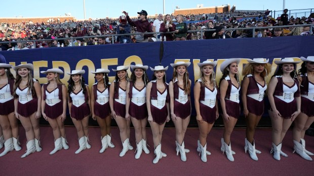 Texas State dancers line up before half time during the First Responder Bowl NCAA college football game Friday, Jan. 3, 2025, in Dallas. (AP Photo/LM Otero)
