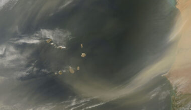 This June 21, 2009, file photo from the NASA Earth Observatory shows Saharan sand blowing off the coasts of Mauritania and Senegal. Although this image shows dust immediately off the coast of West Africa, a layer of dust from storms such as this often travels virtually intact to the other side of the Atlantic. This layer of dry, hot, dusty air is called the Saharan Air Layer.
