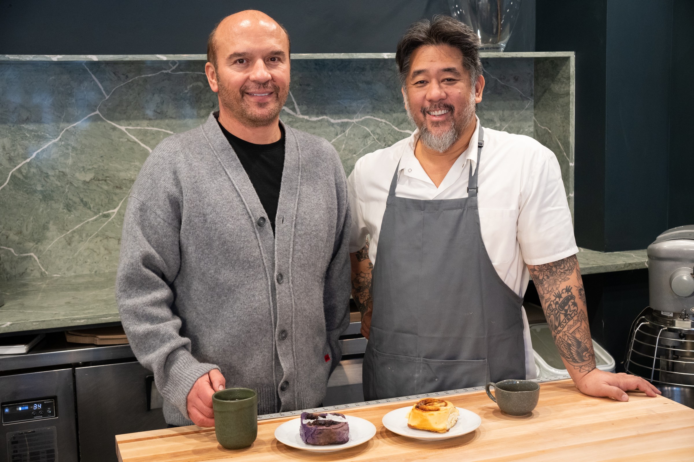 Two owners of a cinnamon roll bakery.