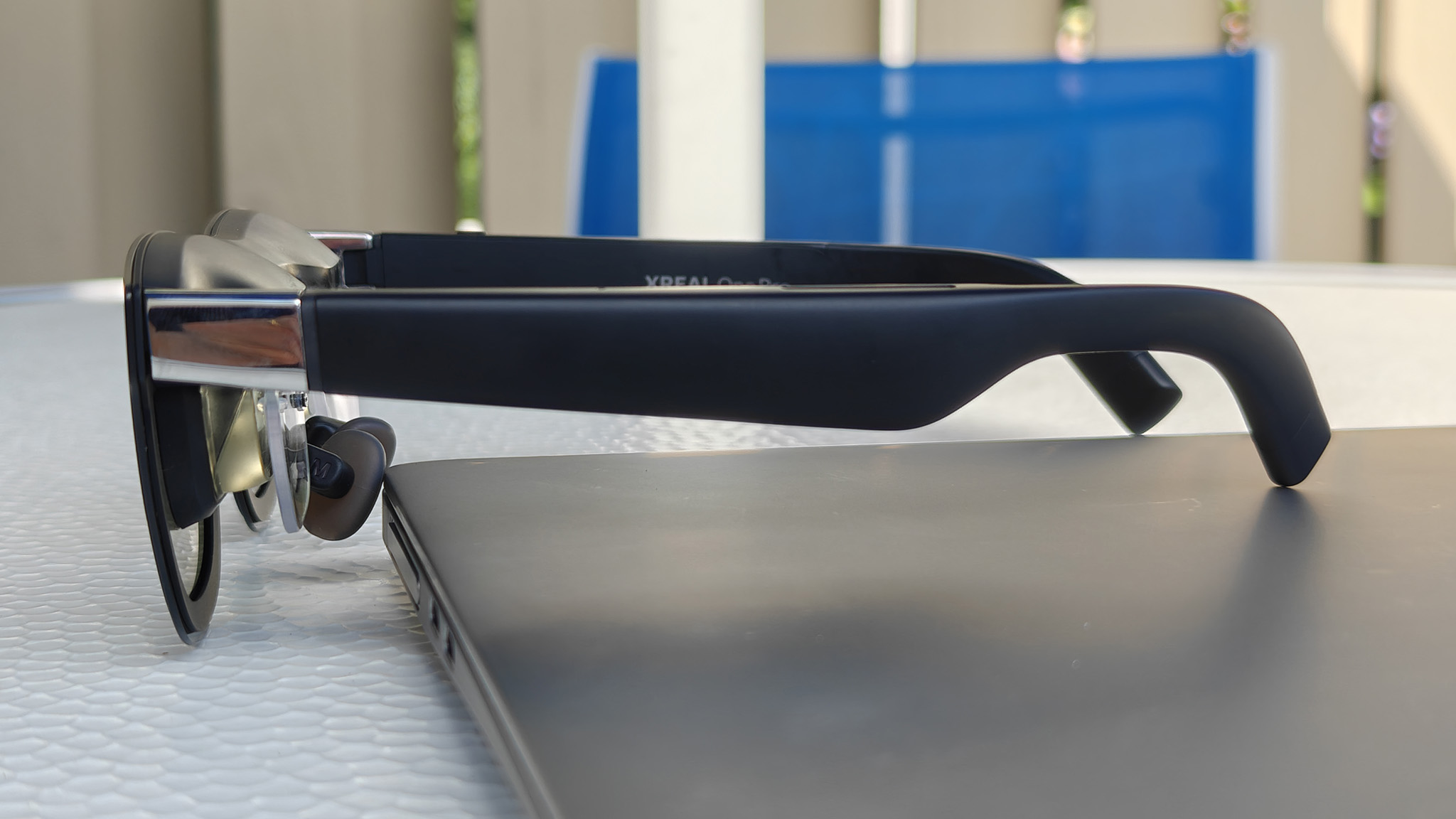 Xreal One Pro smart glasses with an Xreal Eye camera attached