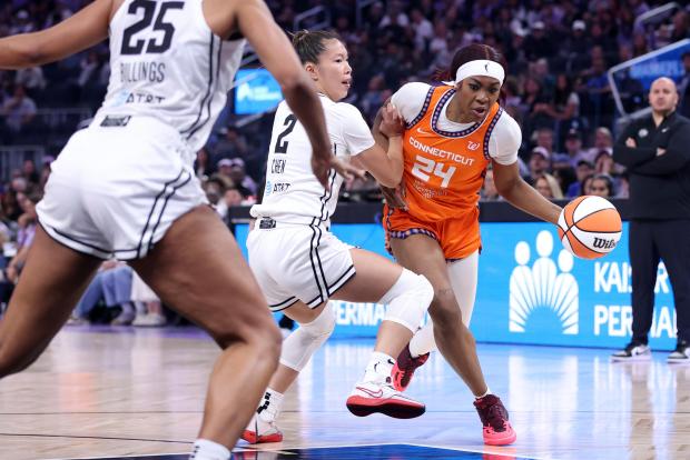 Golden State Valkyries' Kaitlyn Chen defends Connecticut Sun's Aneesah Morrow in 2nd quarter during WNBA game at Chase Center in San Francisco on Sunday, June 22, 2025. (Scott Strazzante/San Francisco Chronicle via AP)