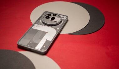 Nothing Phone 3a Pro back view against red background