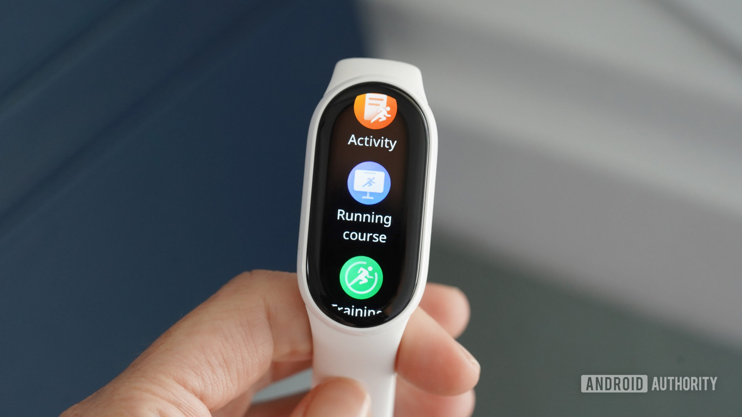 A user taps into the fitness tracking tools of the Xiaomi Smart Band 10.
