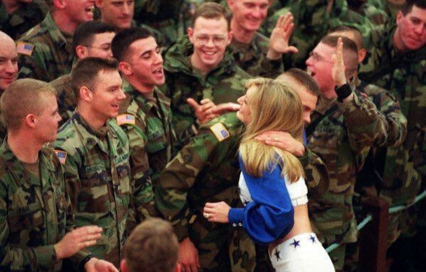 Cheerleader Cheryl Crosby (then Cheryl Gates) on a special USO Tour to perform for troops...
