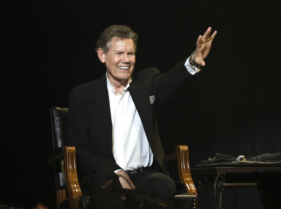 Legendary Country Star, 66, Leaves Fans 'Crying' with Surprise Opry Appearance