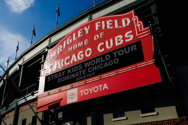 "Stray Kids World Tour Dominate Chicago" is displayed on the marquee outside Wrigley Field before their concert on June 26, 2025. (Armando L. Sanchez/Chicago Tribune)