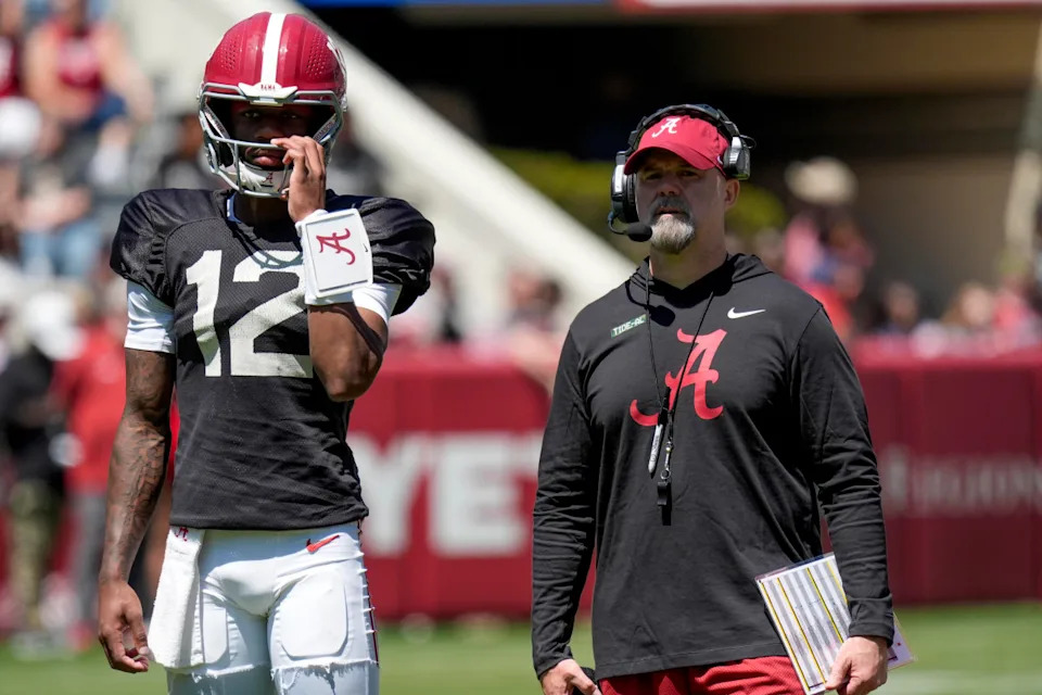 Alabama quarterback Keelon Russell (12) stands with Alabama offensive coordinator Ryan Grubb during A-Day drills at Bryant-Denny Stadium.Gary Cosby&sol;USA TODAY NETWORK via Imagn Images