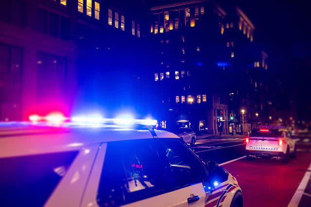 Getty Stock image of police vehicles with overhead lights on
