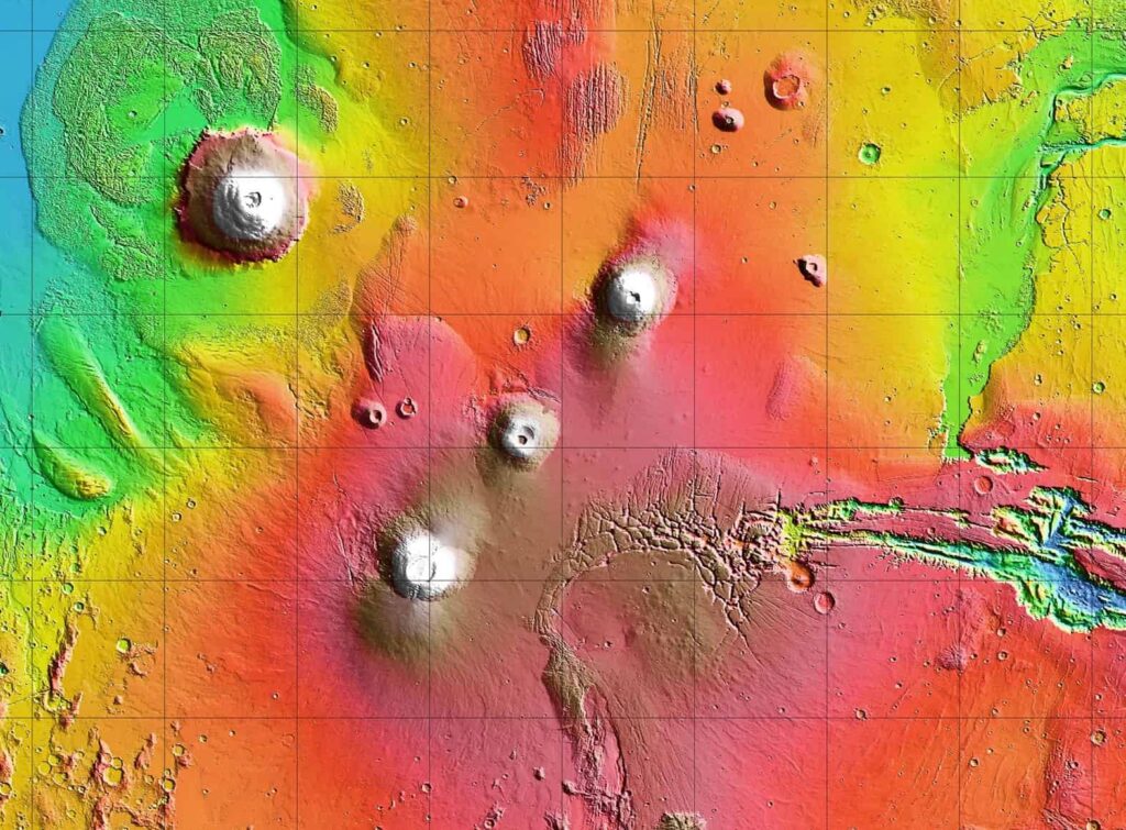Arsia Mons is the southernmost of the three volcanoes that make up Tharsis Montes, shown in the center of this cropped topographic map of Mars. Olympus Mons, the solar system’s largest volcano, is at upper left. 