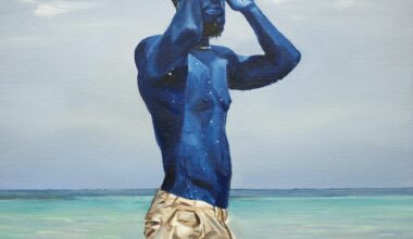 a portrait of a shirtless man with blue skin standing in a body of water