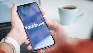 Facebook logo on a phone display