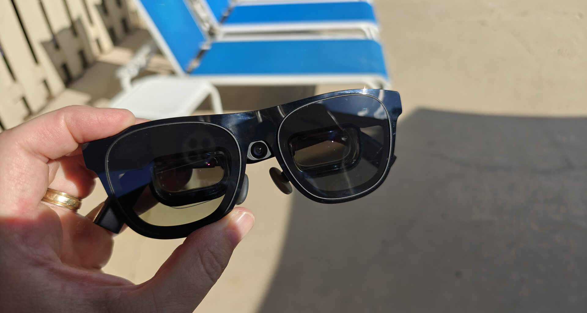 Xreal One Pro smart glasses with an Xreal Eye camera attached