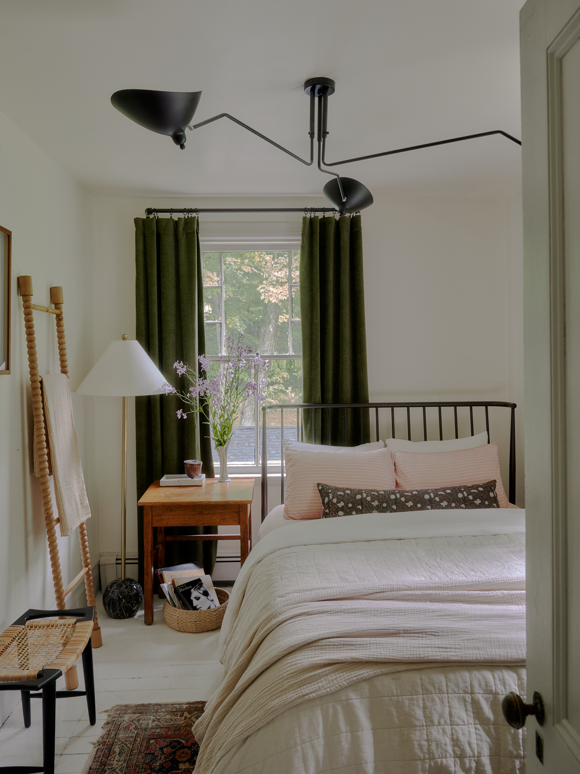 metal bed in small guest room