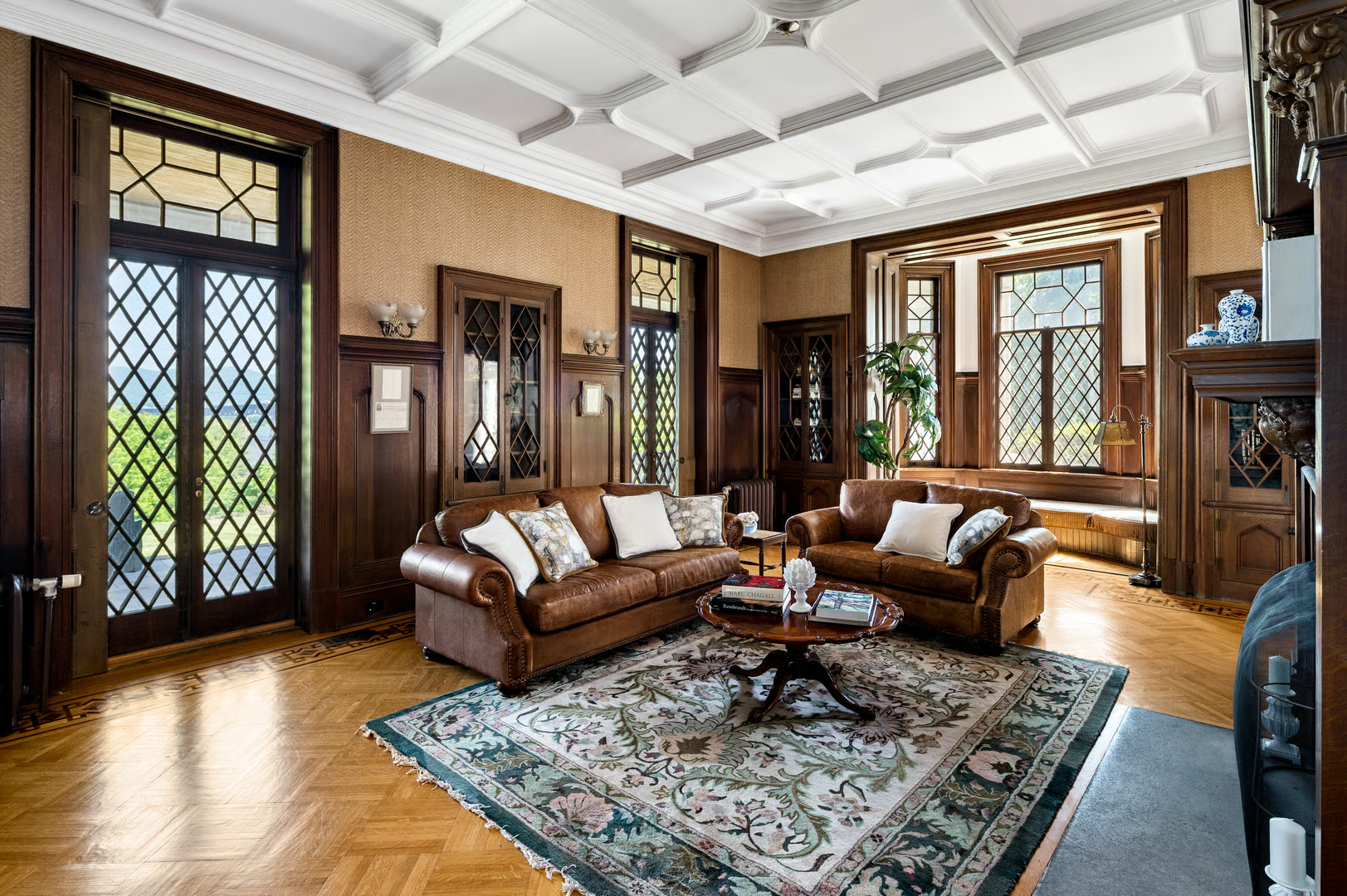 library with built-ins, wainscoting, mantel