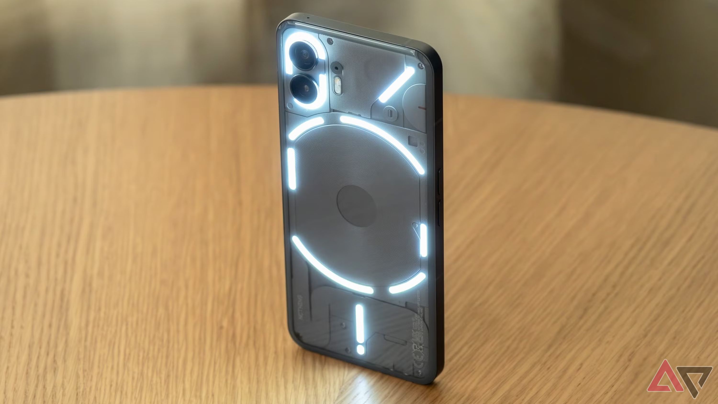 A picture of the Glyph Interface lit up on the back of the Nothing Phone 2.