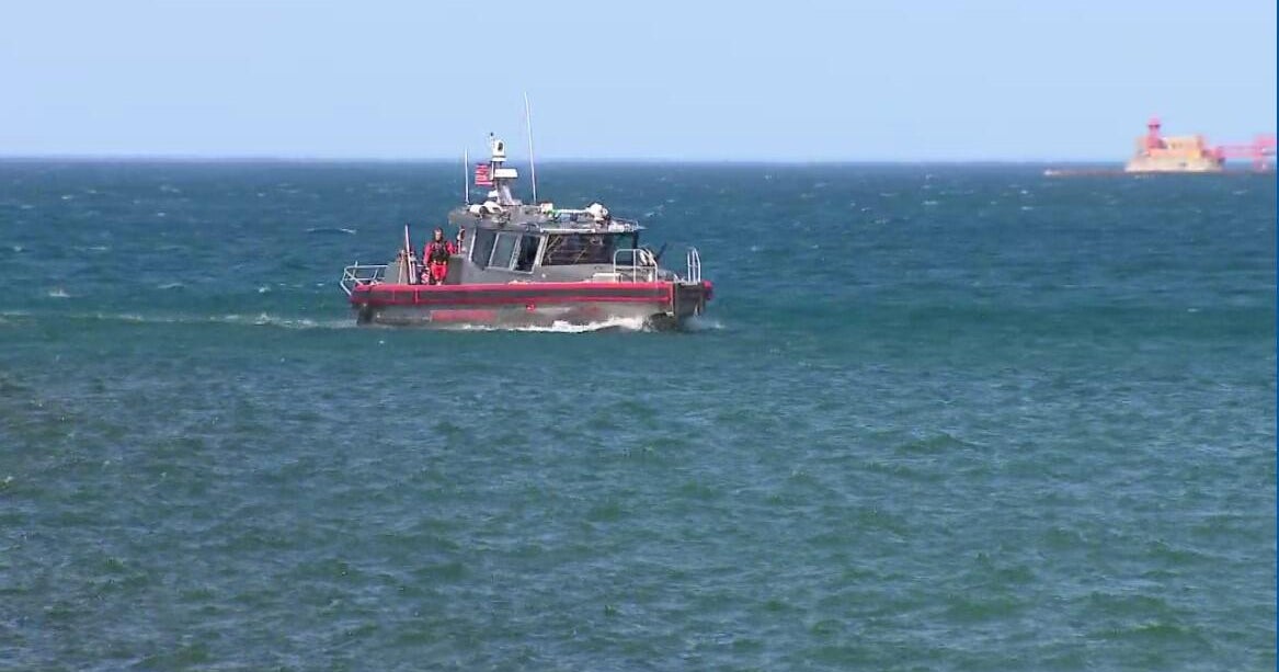 Rescue crews pull multiple people from Lake Michigan as crowds pack beaches amid heat wave