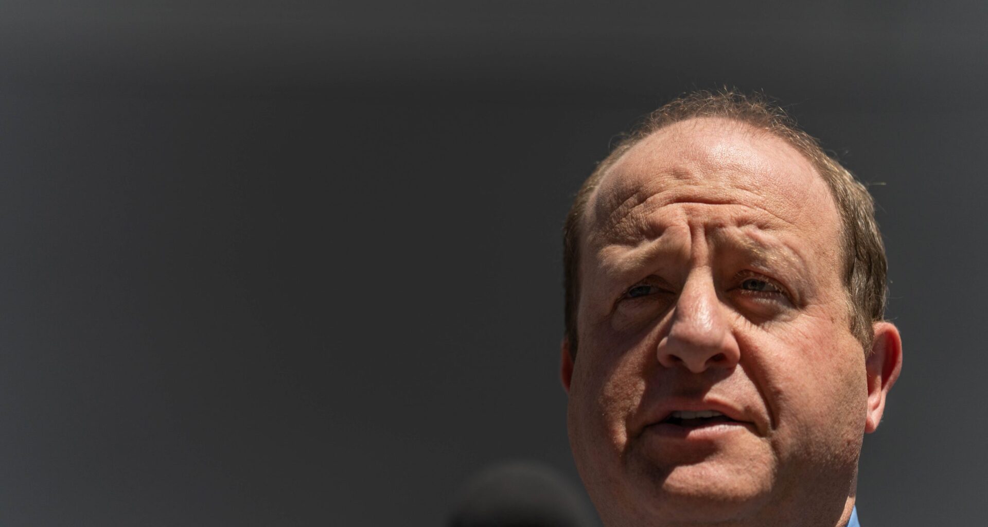 Judge blocks Colorado governor from ordering certain state workers to hand over employment info to ICE