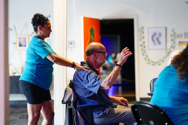 At The Chrysalis: Monarch Center for the Arts in San Diego, CA, on Saturday, June 7, 2025, 72-year-old Ron Weidner worked with his physical therapist, Rosalia Arellano, on hand and foot dance movement. Weidner, a former home painting contractor, retired after later being diagnosed with Parkinson's disease.  (Nelvin C. Cepeda / The San Diego Union-Tribune)